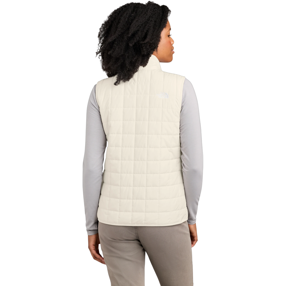 The North Face Women's Iron Drift Quilted Vest in White Dune — custom branded by Motive