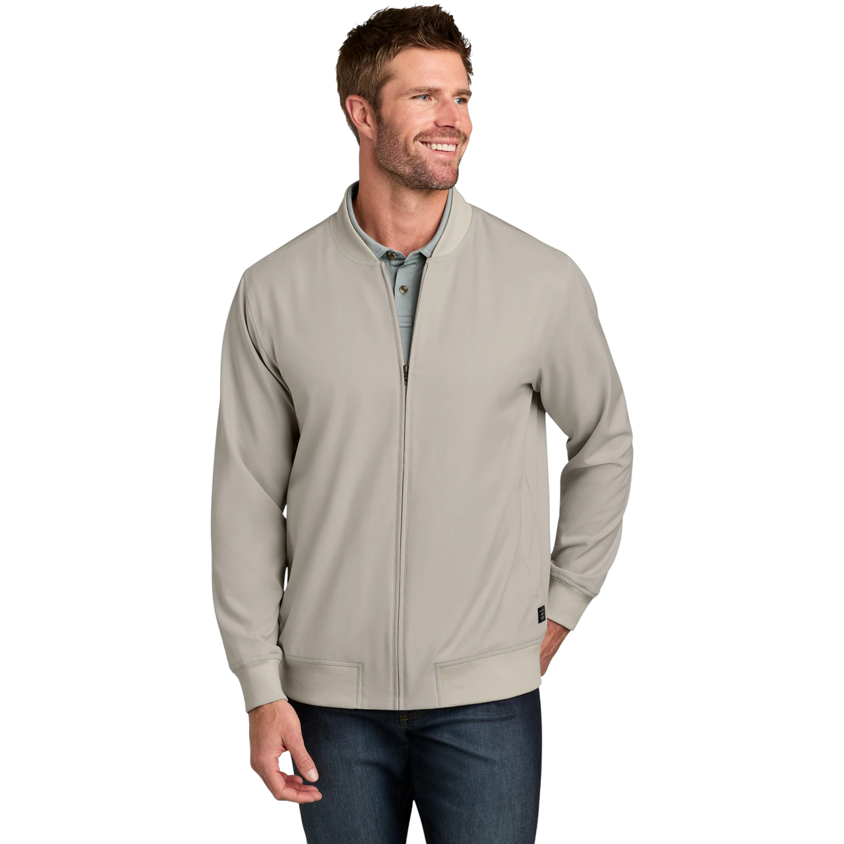 TravisMathew Bomber Jacket in Italian Sand — custom branded by Motive